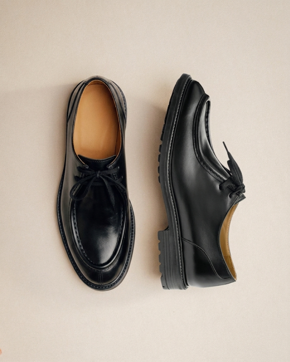 black leather lace up boots