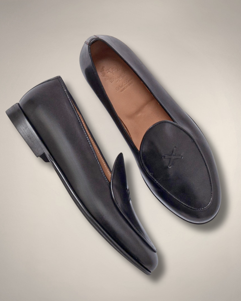 pair of black leather loafers