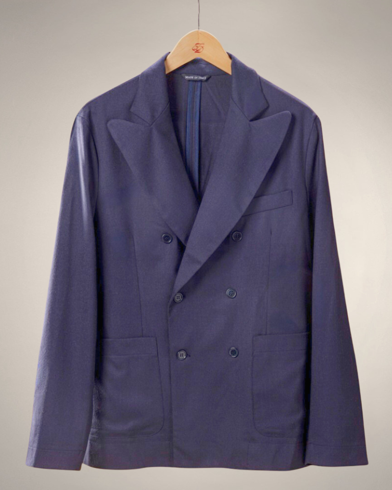 blue double breasted blazer with 2 front pockets, lapels, and button closure